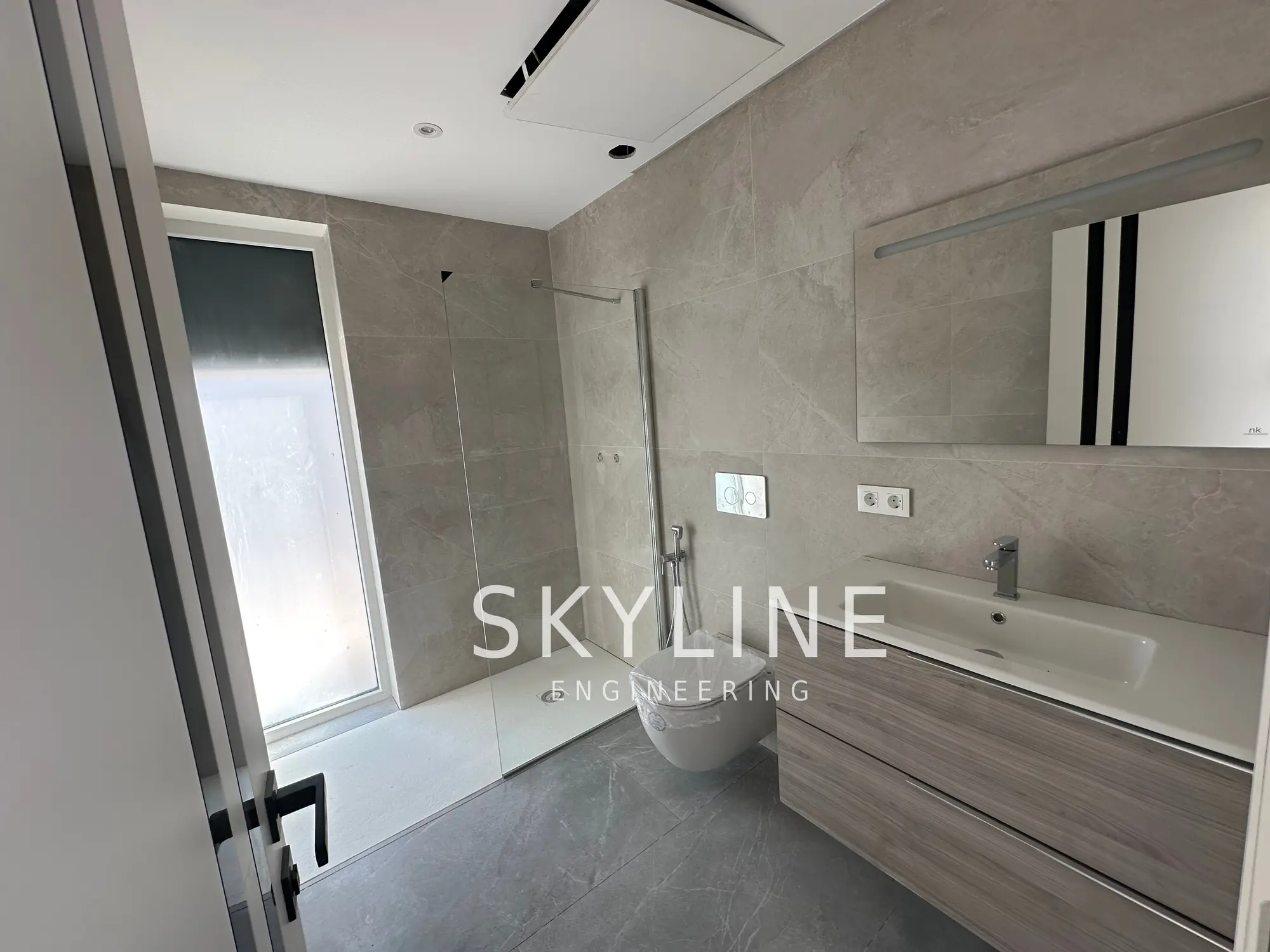 Finished bathroom with walk-in shower and floating vanity in a Lanucia 6 villa, La Nucía