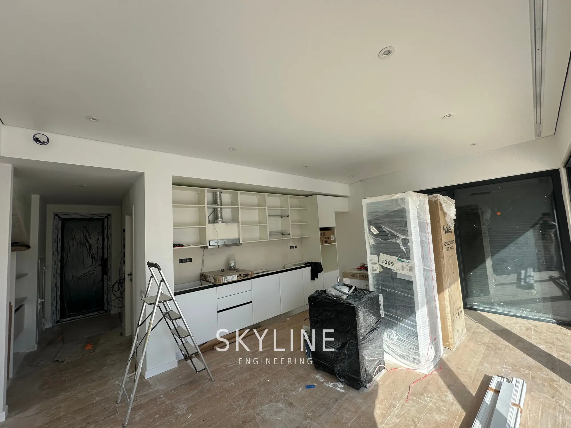 Boxed kitchen appliances delivered ahead of installation inside a Lanucia 6 villa, La Nucía